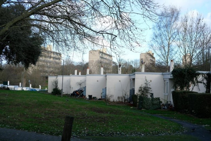 Fig. 78: Minstead Garden bungalows with slab blocks in the background