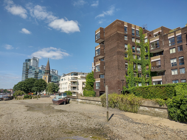 Fig: 63: View from the Thames Path toward St Mary’s showing the taller building development which characterises the area