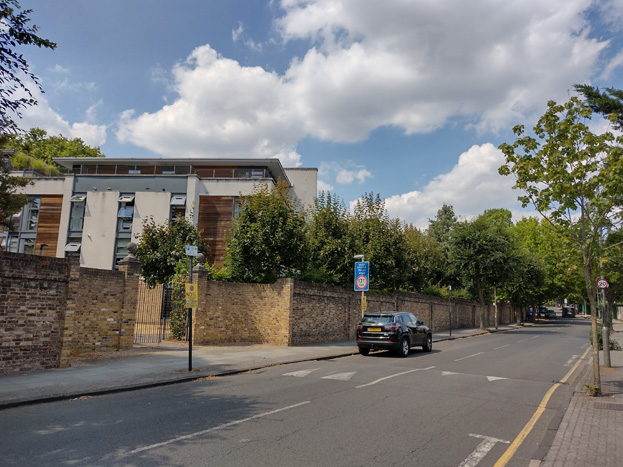 Fig. 68: The robust brick wall to the former college grounds characterises most of Sutherland Grove