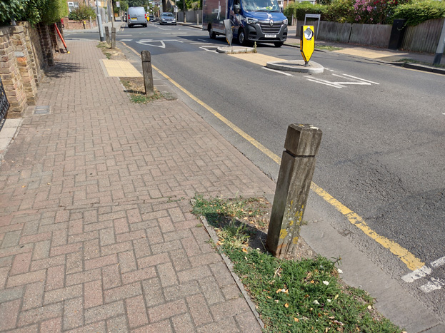 Fig. 81: Timber bollards are common and add further separation to pedestrian areas from traffic