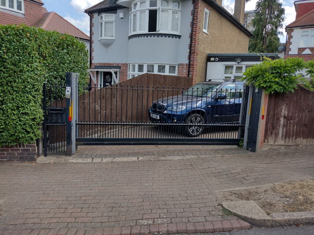 Fig. 66: Metal gates and powered gates are uncharacteristic and visually obtrusive