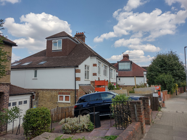 Fig. 33: The curvature of the road affects the placement of the houses, with their side elevations prominently exposed