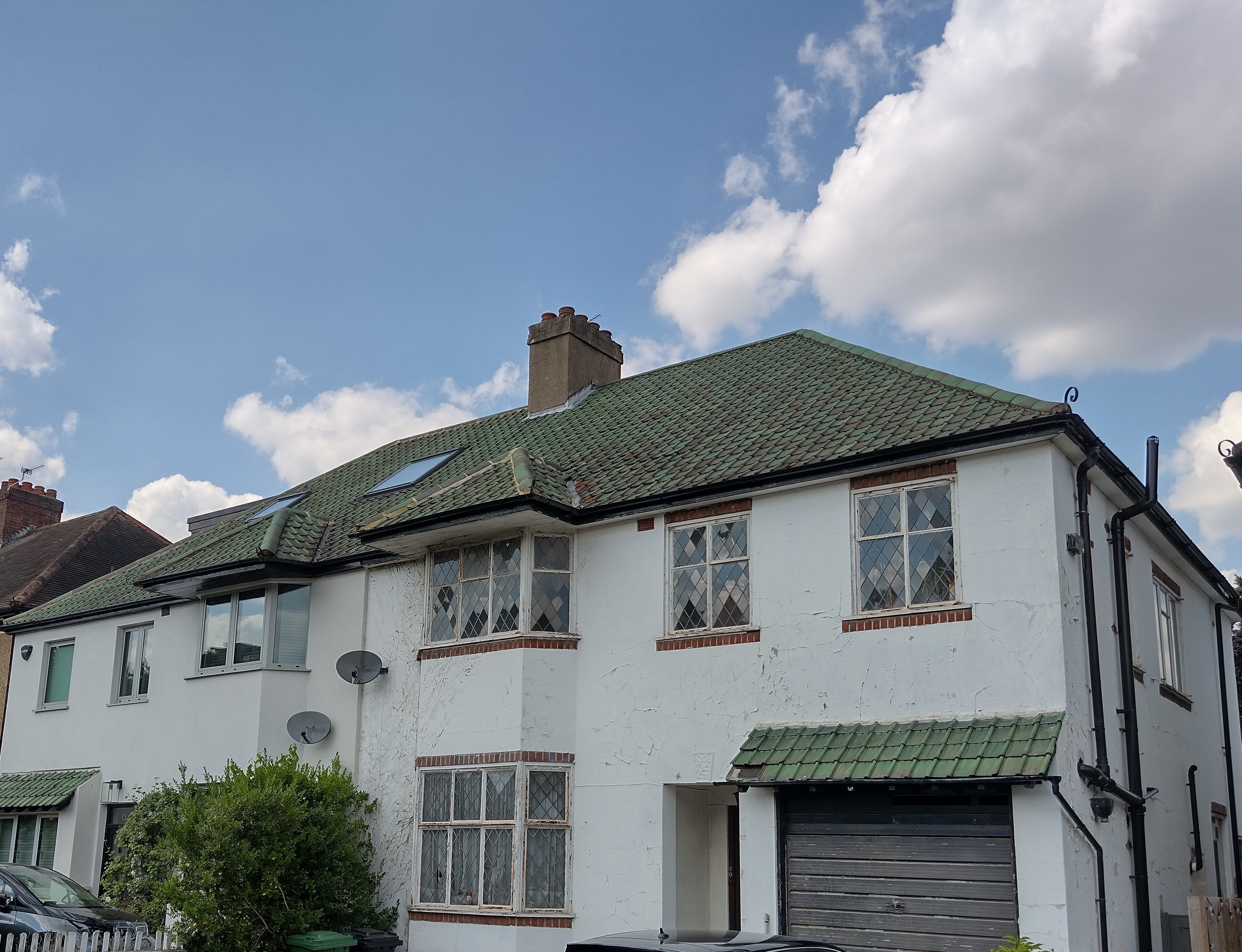 Fig. 53: Green roof tiles are characteristic of Goodwood Road. This house also has attractive original casement windows