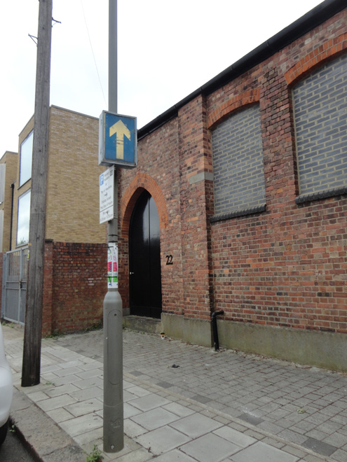 Figure 54: Internally illuminated street sign, and telegraph pole outside 22 Balham New Road