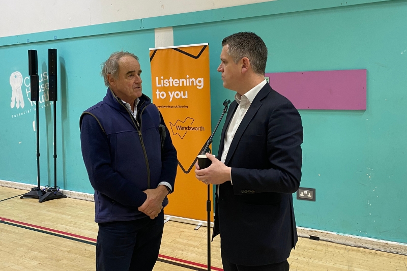 Simon Hogg, council leader, speaks to a resident